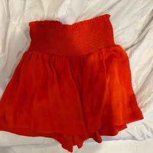 Bright red shorts/ skirt